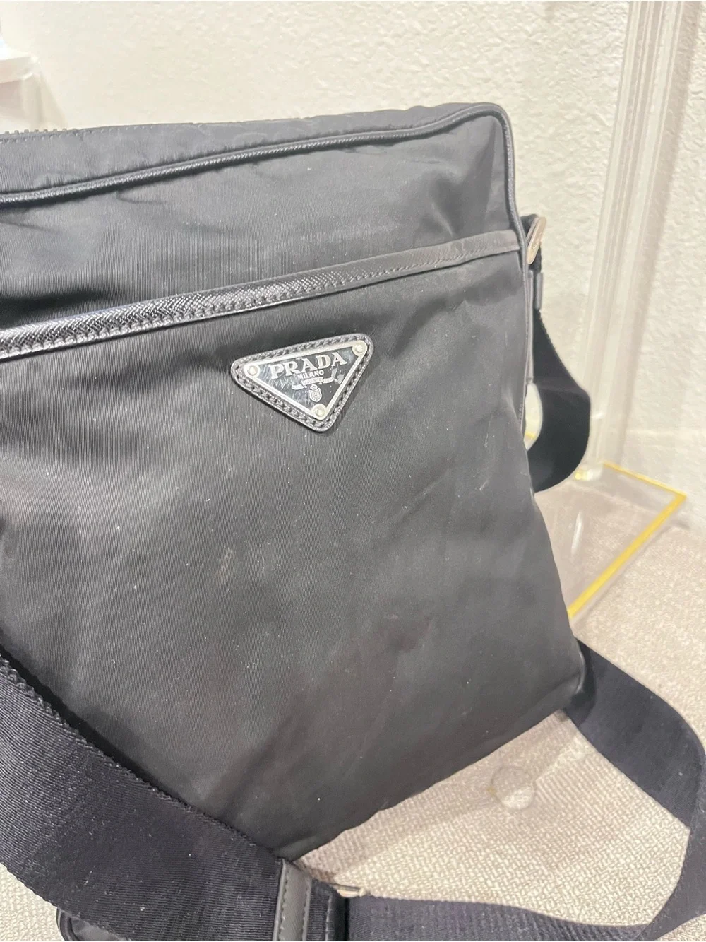 PRADA TESSUTO NYLON AND SAFFIANO LEATHER MESSENGER BAG.